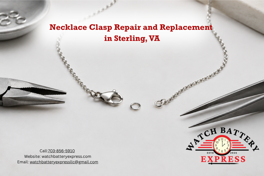 Silver-colored necklace with a lobster clasp and separate connecting ring, beside pliers and tweezers on a white workbench