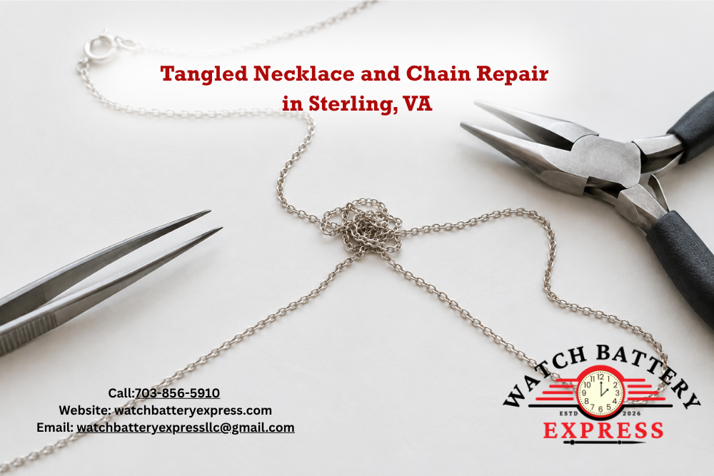 Silver-colored necklace chain with a tangled knot beside precision tweezers and pliers on a white workbench